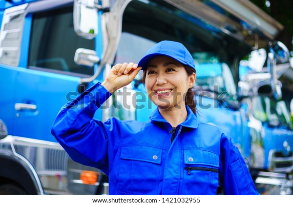 Heavy truck and driver\
woman