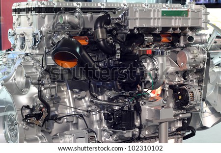 Similar – Truck Engine Motor Components In Car Service Inspection