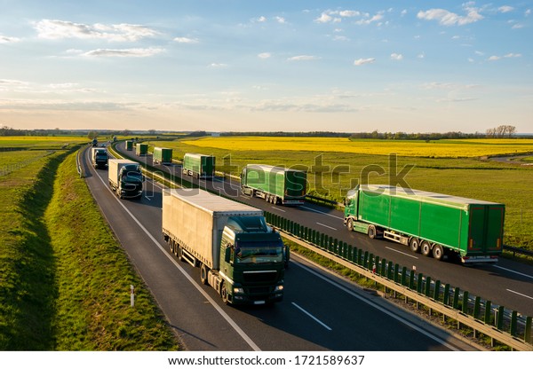 heavy truck\
traffic on the highway in the\
evening