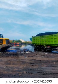 A Heavy Vehicle Carrying Coal In The Coal Stockyard 