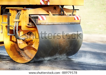 Similar – Image, Stock Photo Road building machinery, asphalt paver with level sensors for good road evenness, ultrasonic measuring accuracy