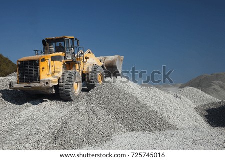 Similar – Bucket-wheel excavator in the Garzweiler 2 open-cast lignite mine, lignite-fired power plants in the background