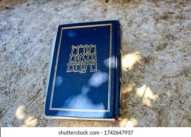 Hebrew Bible On A Background Of Stone (translated From Hebrew On The Book Hebrew Bible: Torah, Neviim, Ketuvim Or Acronyms - Tanakh), Israel