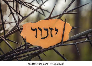 Hebrew inscription yizkor, remember in hebrew and the name of a prayer in memory of deceased beloveds. Remembrance Day.