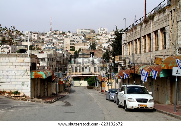 HEBRON, PALESTINIAN AUTONOMY /\
ISRAEL - APRIL 12 : View from street in the Jewish quarter to the\
Muslim quarter (in the background) on 12.04.2017 in\
Hebron.