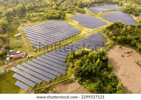 Hectares of former farmland or agricultural areas in the countryside used as a solar farm. At Miagao, Iloilo, Philippines.