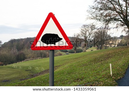 Hedgehog road sign in the UK to slow down drivers and warn them of animals
