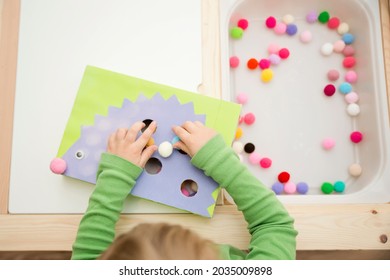 Hedgehog. Sorting Game For Young Children. Fill The Holes With Pompoms. Early Education, Color Learning And Numeracy. Montessori Themed Implement For Preschool And Special Needs School