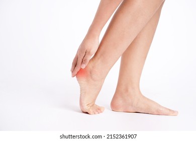 Heel pain , Heel, Hands touching heels on white background. - Shutterstock ID 2152361907