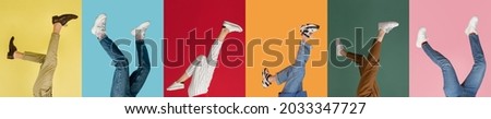 Heels over head, upside down. Collage with female and male legs in colored sneakers, trainers isolated over bright multicolored background. Concept of fashion, sales, discounts. Copyspase for ad.