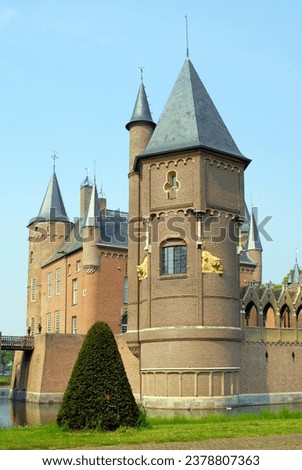 Heeswijk Castle with bridge over the canal and corner towers Stock photo © 