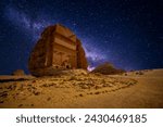 Hegra Al Ula in Saudi Arabia with milky way at night.