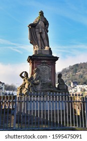 Heidelberg, Germany - December 2019: Bridge Sculptures Of Prince Elector Carl Theodor At Karl Theodor Bridge, Also Known As The Old Bridge, Called 'Alte Brücke In Germany 