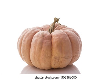 Heirloom pumpkin on white background Also known as Musquee de Provence or Fairytale pumpkin