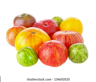 Heirloom Tomatoes With Water Drops On White Background