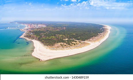 Hel Peninsula - aerial panoramas. Beaches on the helium and the city in the distance. A sea landscape with a hazy horizon.