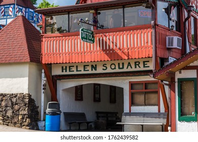 Helen, GA/USA May 24, 2020: Entrance To Shops In Helen Square On Main Street. Above Is A Tattoo And Body Piercing Shop