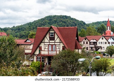 Helen, Georgia Bavarian Town Cityscape Townscape With Red Roof Buildings Of German Architecture Replica With Blue Ridge Mountains During Oktoberfest And Towers