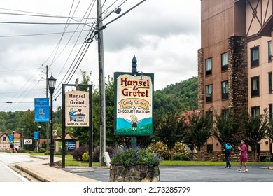 Helen, USA - October 5, 2021: Bavarian Village Of Helen, Georgia Street With Sign For Famous Hansel And Gretel Chocolate Factory Candy Kitchen With Samples And Tours