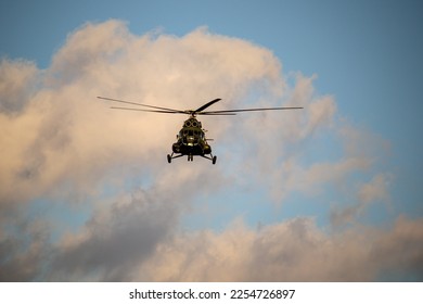 Helicopter approach at the summer evening - Shutterstock ID 2254726897