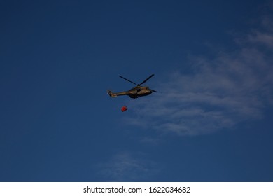 Helicopter Disaster Rescue Wildfire In Sky With Clouds