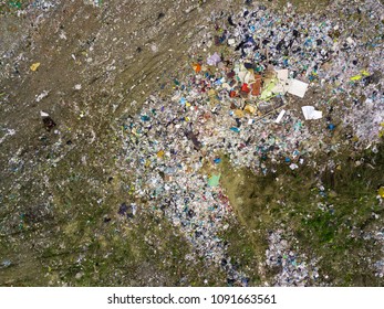 Helicopter drone shot. Aerial photography is a modern urban dump. Landfill with a lot of debris polluting the ecological environment of the city - Powered by Shutterstock