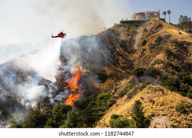 A Helicopter Fighting The Wildfire In California 