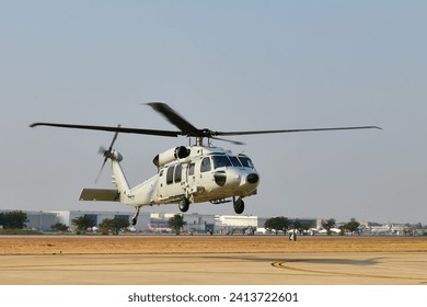 Helicopter flying attack armed force four blades  rotor black hawk. 