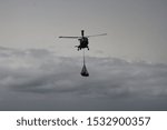 Helicopter flying during naval exercises