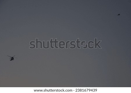 Helicopter flying in the morning