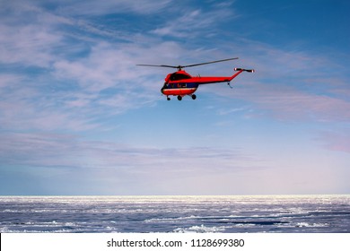 Helicopter with glaciologists and tourists-extreme over clouded Arctic glaciers.