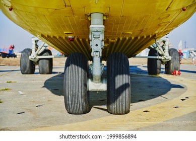 Helicopter landing gear with aircraft thrust pad. Landing gear of military helicopter. Wheel Of Airplane Or Helicopter. - Shutterstock ID 1999856894