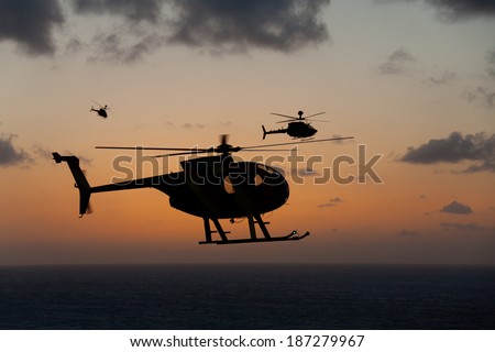 Helicopter over gorgeous Hawaii sunset horizon