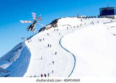 Helicopter Over Ski Run In Winter, Lech, Austria