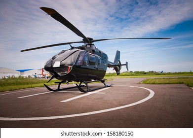 Helicopter parked at the helipad - Shutterstock ID 158180150