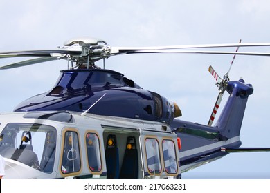 helicopter parking landing on offshore platform. Helicopter transfer crews or passenger to work in offshore oil and gas industry.