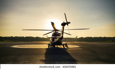 helicopter parking landing on offshore platform, Helicopter transfer crews or passenger to work in offshore oil and gas industry, air transportation for support passenger, ground service.