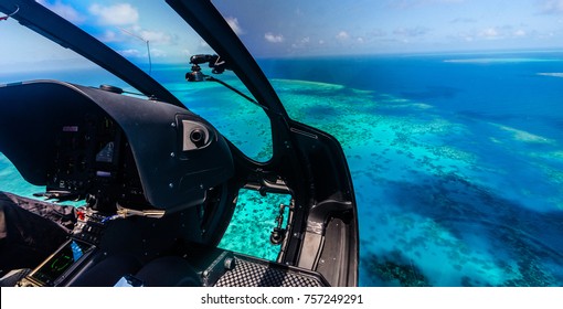 Helicopter ride over Moore Reef, part of the outer Great Barrier Reef in Australia - Powered by Shutterstock