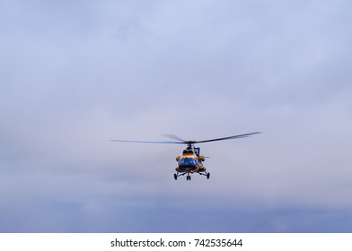 The helicopter in the sky. Saint-Petersburg. Russia.