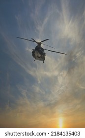  helicopter at sunset sky 