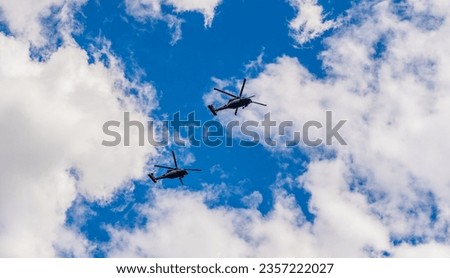 Helicopter tour. helicopter flying in the sky. two helicopter rotorcraft. police helicopter. heli copter flight
