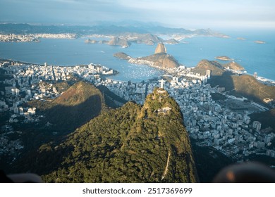 Helicopter view of the christ the redeemer statue in Rio de Janeiro at sunset above the city - Powered by Shutterstock