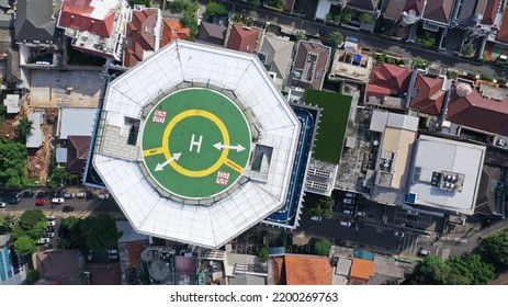 A Helipad Is Seen On The Top Of A Building In Downtown Jakarta City