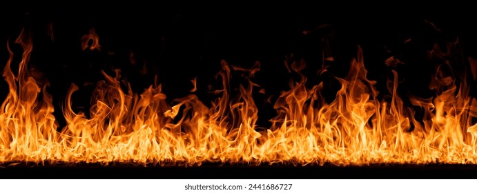 Hell flames, devil's mouth. fire banner. A background of scalding flames. Firestorm. Fire burning. Bright burning flames on a black background. Wall of Real fire, abstract background. Fire flames