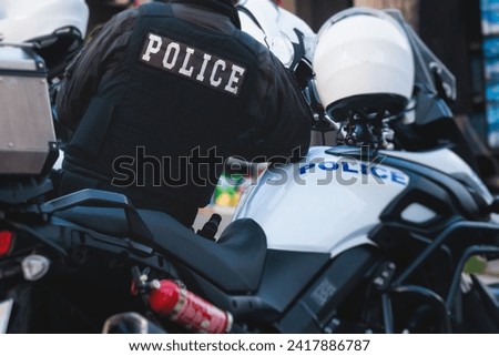 Hellenic Police, Greek police squad on duty riding bike and motorcycle, maintain public order in the streets of Athens, Attica, Greece, group of policemen with 