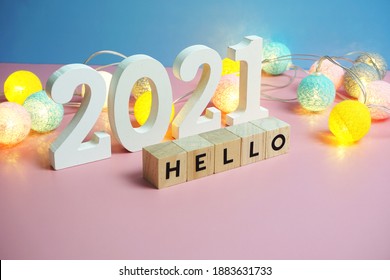 Hello 2021 word alphabet letters on pink and blue background - Powered by Shutterstock