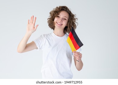 Hello! Beautiful Young Woman With Flag Of Germany. Learn German.