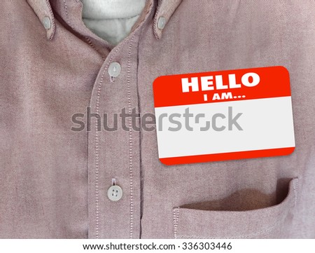 Hello I Am blank name tag worn by person in red button shirt