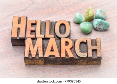 Hello March in vintage letterpress wood type with green gemstone crystals