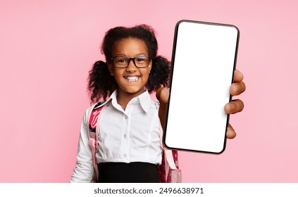 Hello, New School. African Schoolgirl Waving Hand Greeting Smiling To Camera On Yellow Background. Studio Shot - Powered by Shutterstock